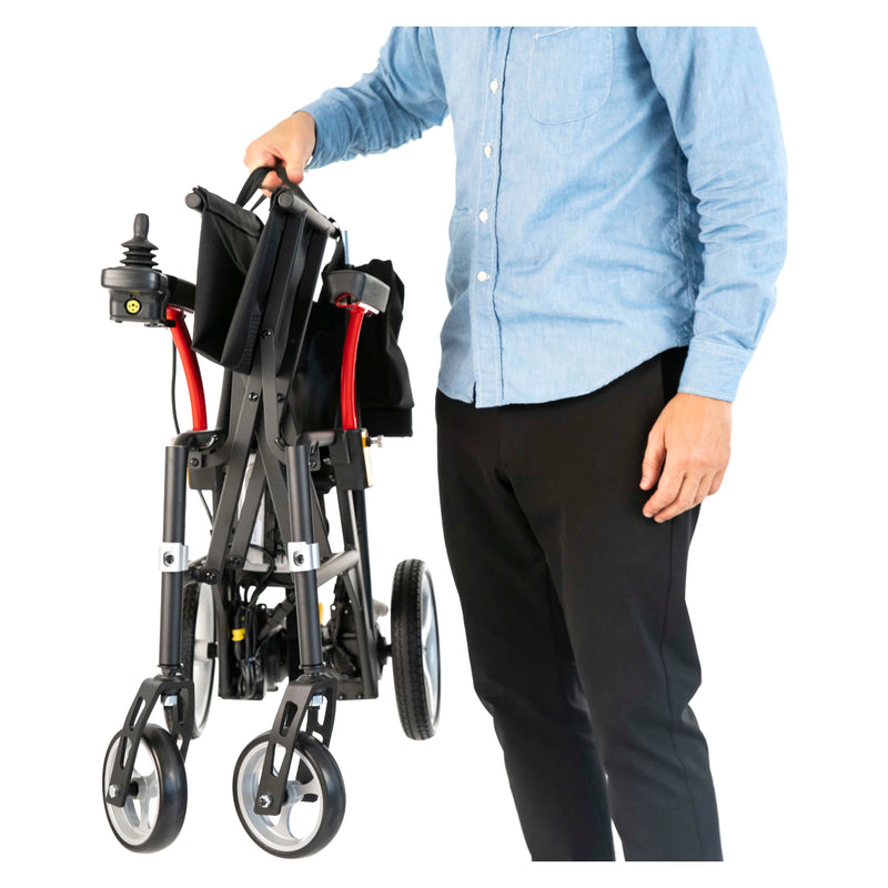 Feather Power Chair – folded, carried by the handle