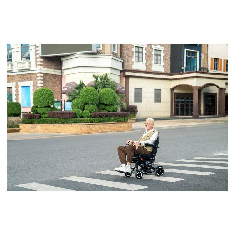 Paiseec Q3 Lightweight Folding Electric Wheelchair – crossing the road