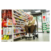 Paiseec Q3 Lightweight Folding Electric Wheelchair – in the grocery aisle