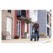 Rollz Flex2 Folding Rollator with Shopping Bag – seat in use