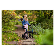 Rollz Motion Performance All-Terrain Rollator & Transport Chair – Jungle Green on a park path