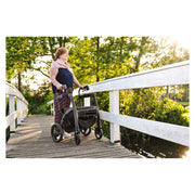 Rollz Motion Rhythm Rollator for Parkinsons – in use outdoors