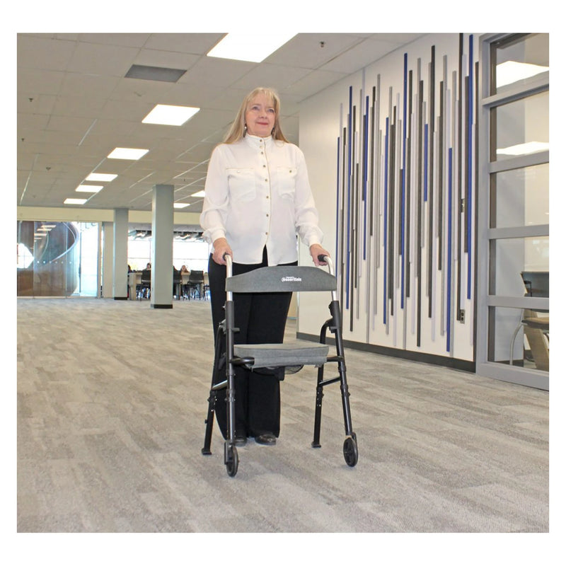 Triumph Essentials walker with seat – in use